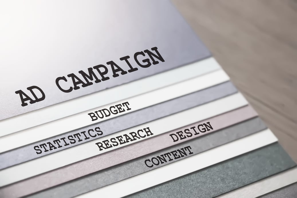 Ad Campaign budget design content research statistics. words. Business concept